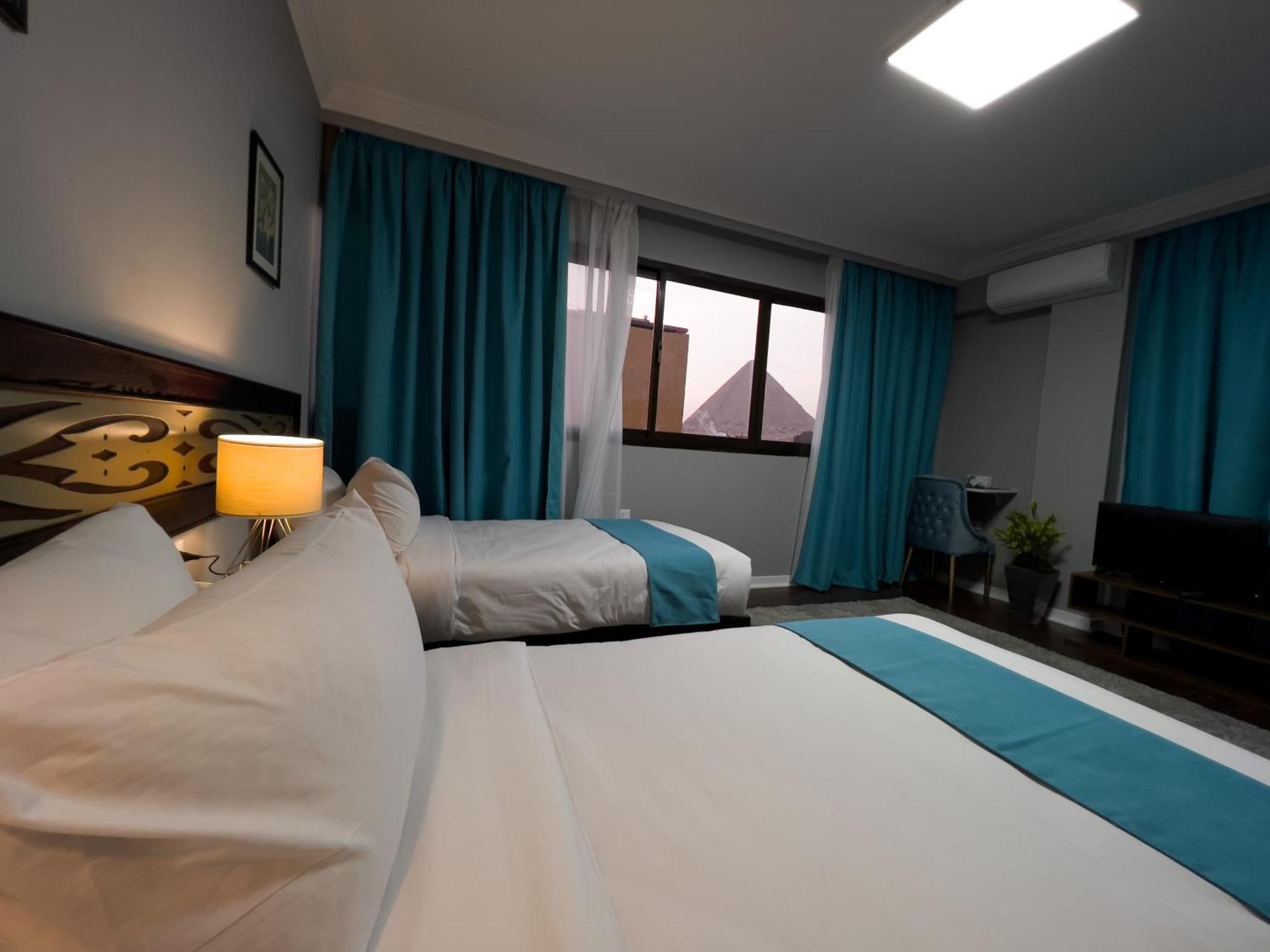 Pyramids Gate Hotel Kafret el-Gabal エクステリア 写真