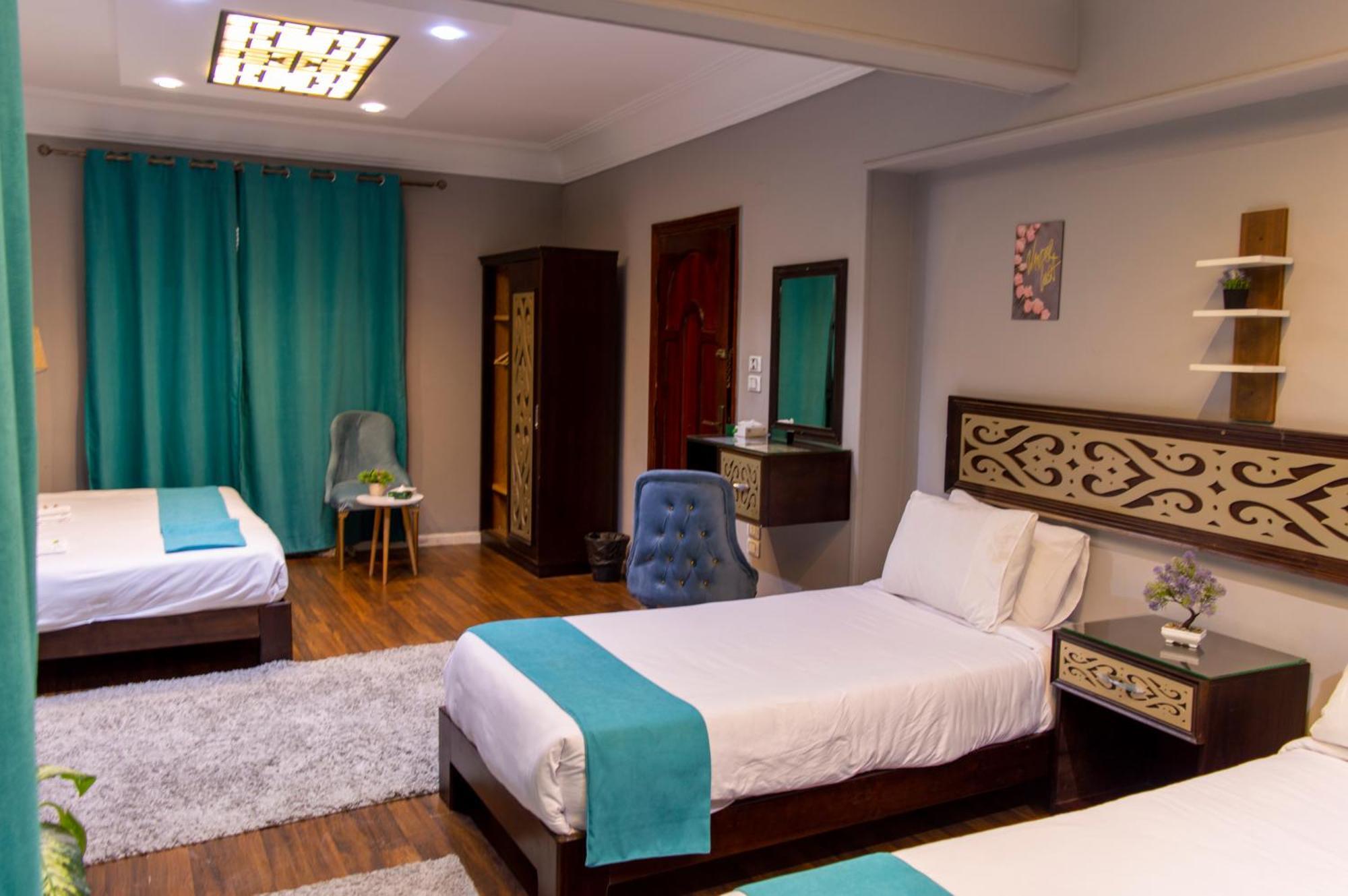 Pyramids Gate Hotel Kafret el-Gabal エクステリア 写真
