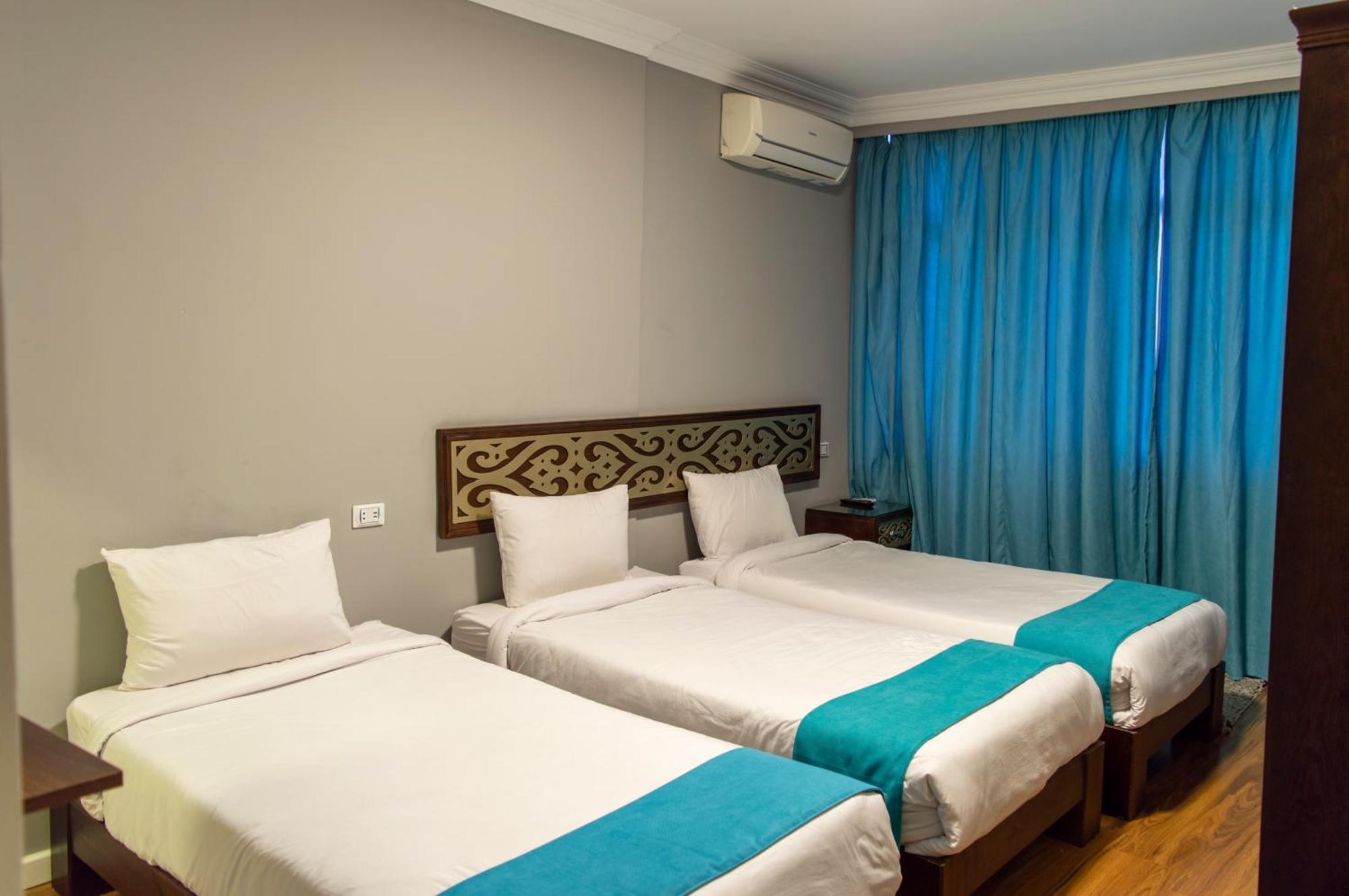 Pyramids Gate Hotel Kafret el-Gabal エクステリア 写真